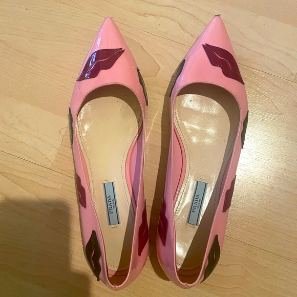 Prada leather flats with colored lip embellishments. - Picture 1 of 9